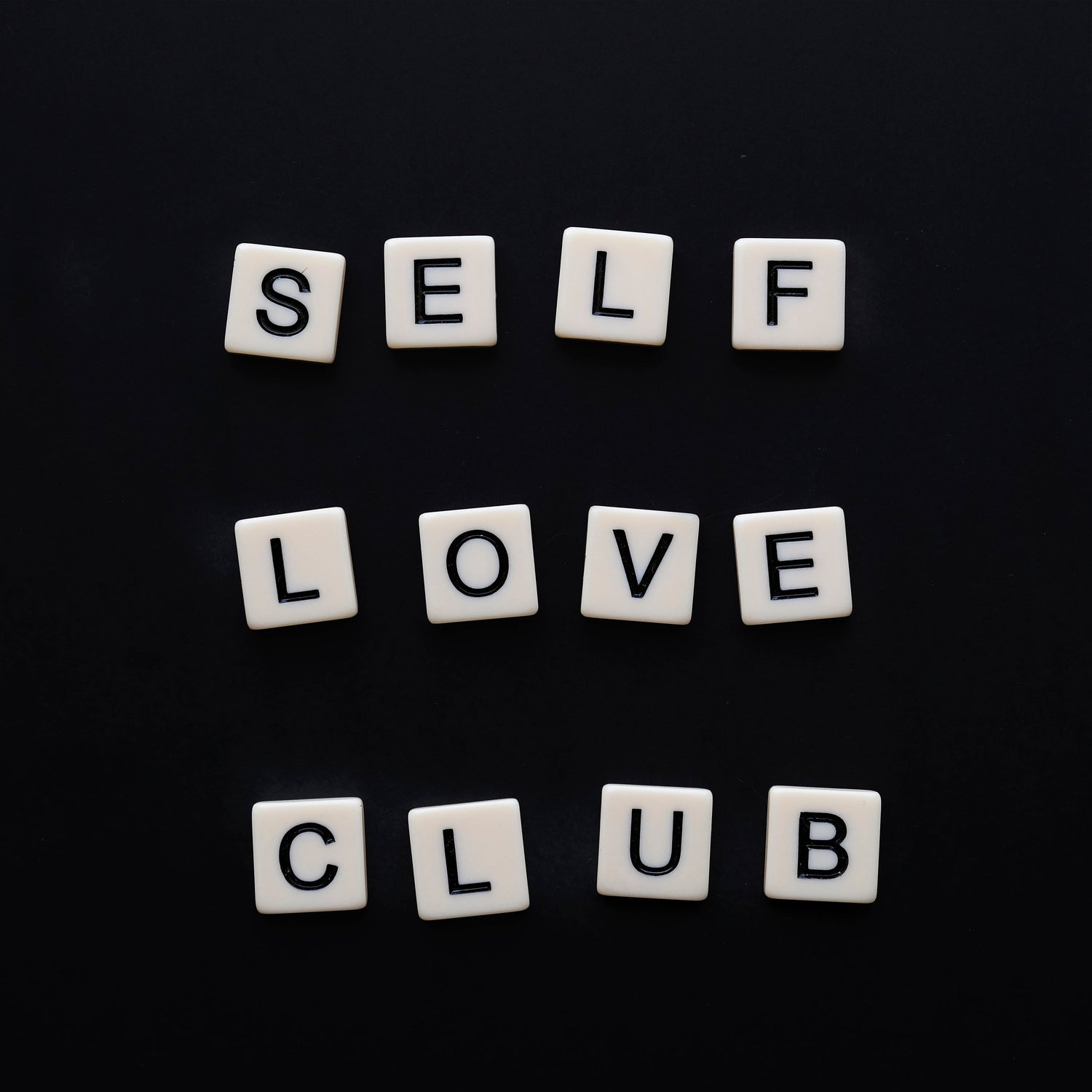 white-tiles-spell-out-self-love-club